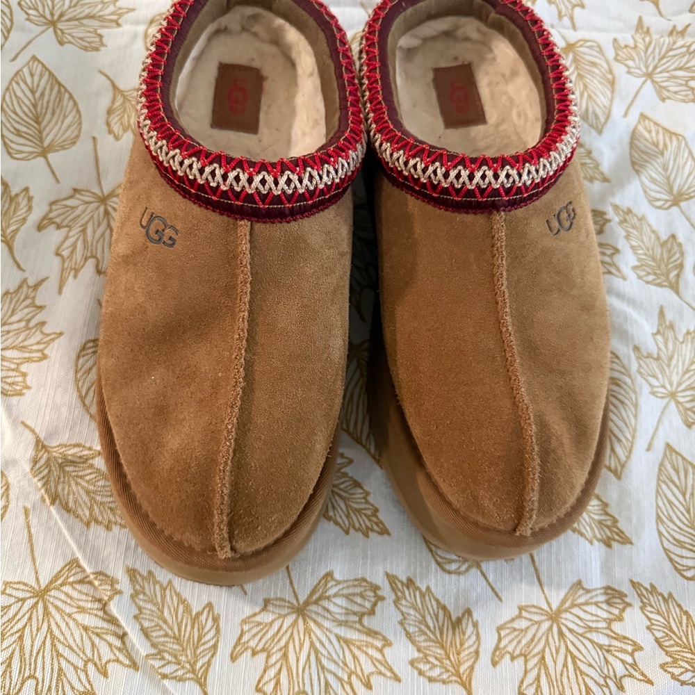 UGG Tan Slippers with Red Stitching